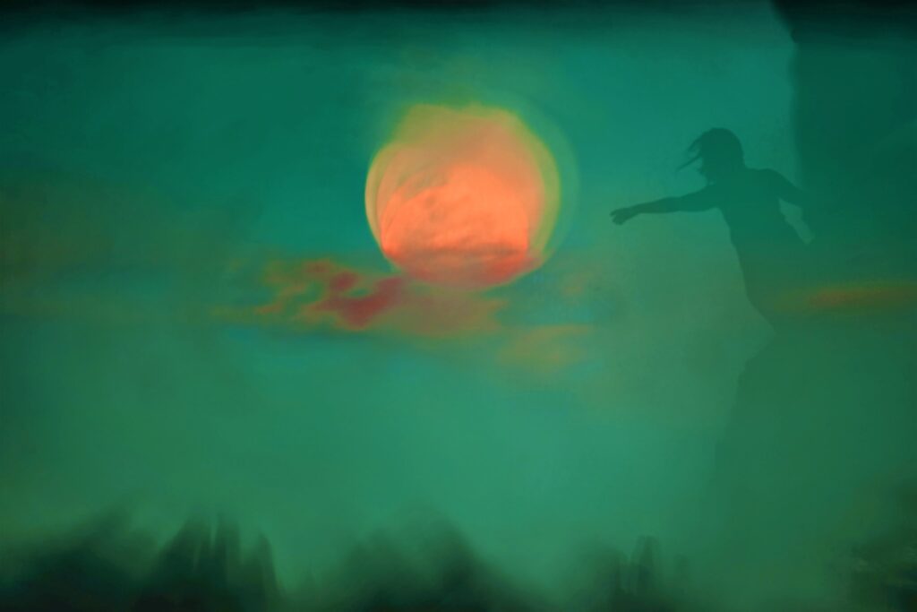 Mystical image of person reaching for the moon. Dreamwork awakens the psyche, including astral projection, lucid dreaming, and creative dreaming.